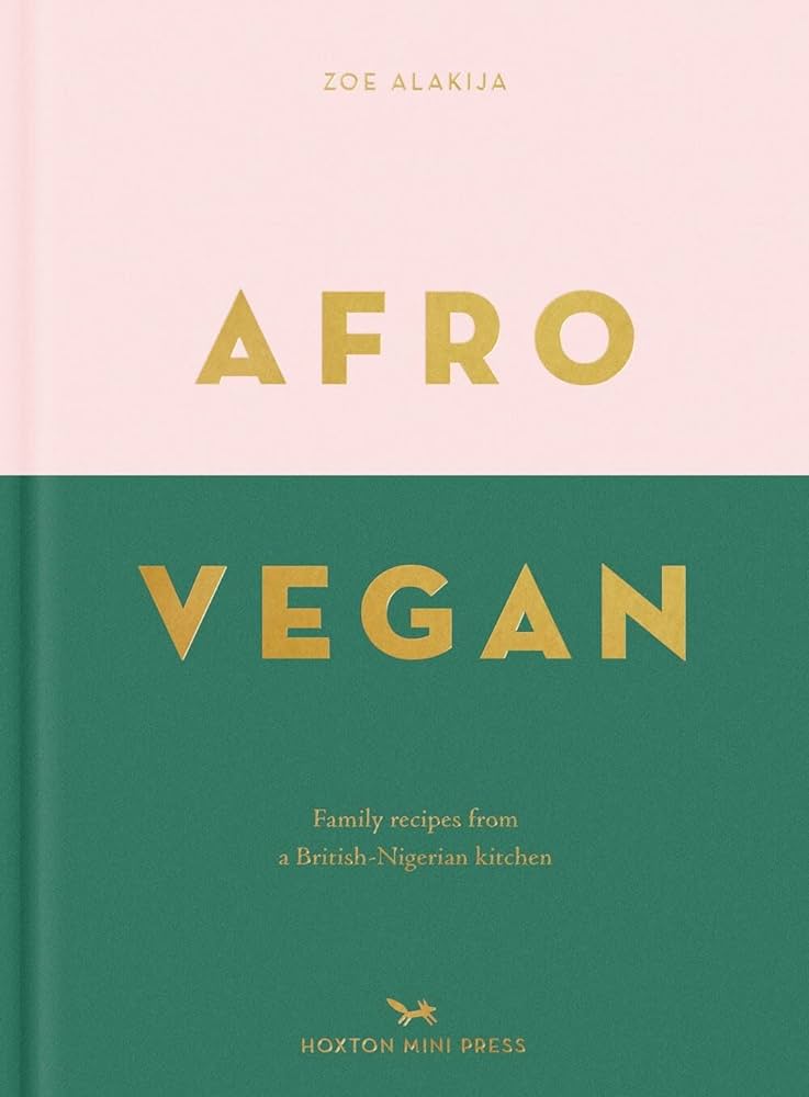 The book cover "Seasoned" by Sonia's Vokalized Kreations showcases gold text on a pink and green background. The subheading, "Family recipes from a British-Nigerian kitchen," presents an Afro-Vegan cookbook experience with flavors like seafood spice blend and Barbados hot pepper sauce.