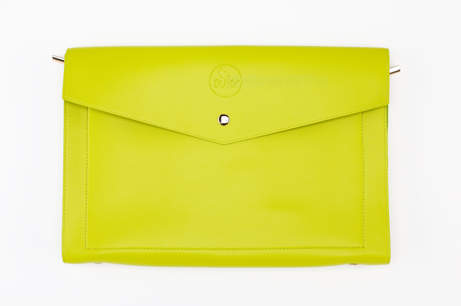 Introducing the Pompei & Brooklyn Bundle by Sonia's Vokalized Kreations: A lime green envelope-style leather clutch designed to empower women, featuring a subtle embossed logo at the top center that merges elegance with confidence.