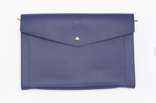 Introducing Sonia's Vokalized Kreations' Ja-Lyn clutch: a stunning royal blue, envelope-style leather accessory with a button closure and an embossed circular logo on the flap, elegantly complemented by a white background.