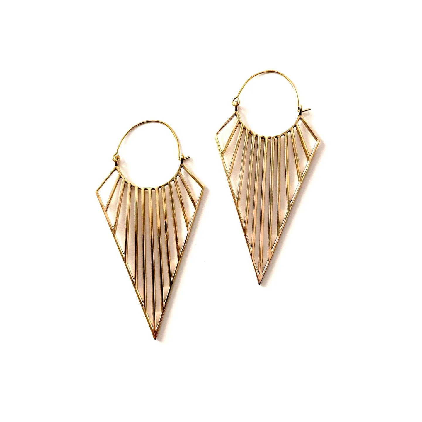 The Jali Brass Earrings by Sonia's Vokalized Kreations are geometric gold hoops featuring triangular shapes and radiating linear bars.