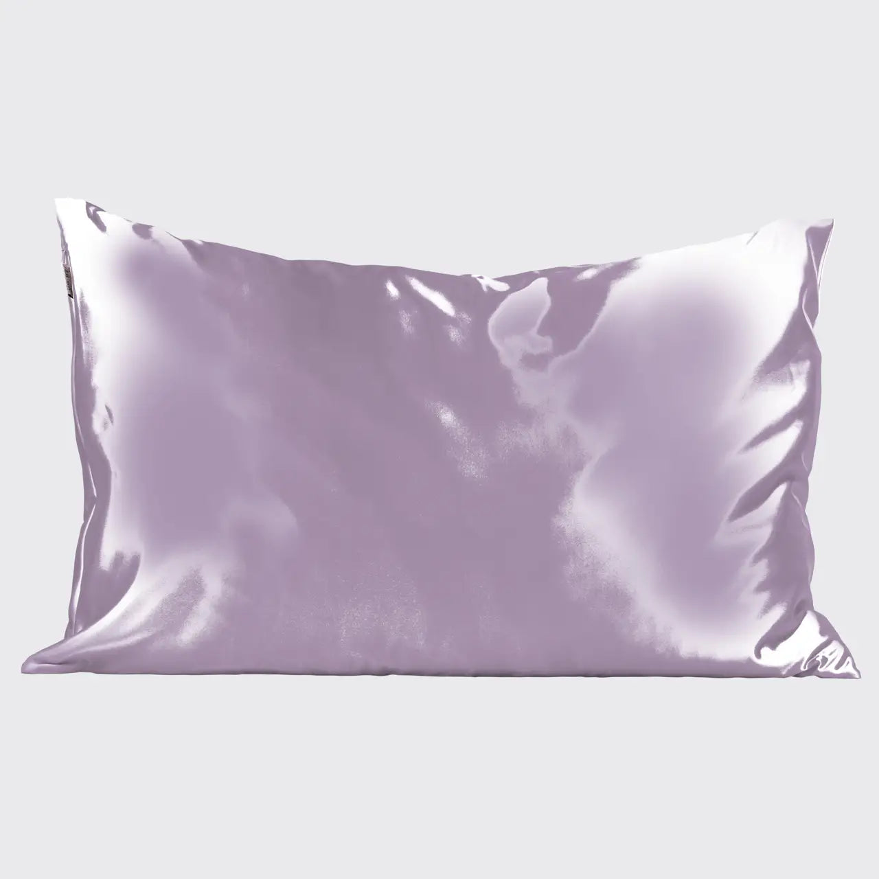 Enhance your beauty sleep with Sonia's Vokalized Kreations Satin Pillowcase in shiny lavender, offering a smooth, glossy surface on a plain light gray background. Its design soothes and prevents facial creases for rejuvenating rest.