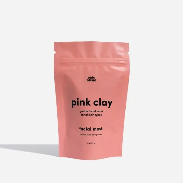 A pink package of Sonia's Vokalized Kreations Pink Clay Facial Mask, featuring French pink clay and botanical skincare benefits for all skin types, set against a pristine white background.