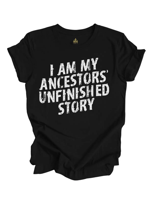 The "I Am My Ancestors' Unfinished Story" Adult Tee by Sonia's Vokalized Kreations features bold white text on black—perfect for celebrating Juneteenth and honoring heritage.