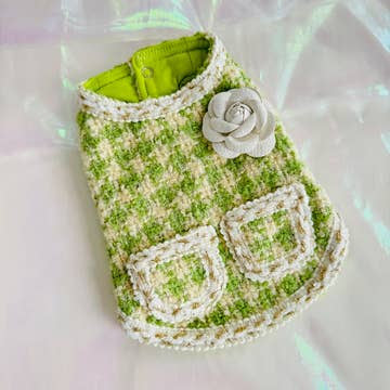 Sonia's Vokalized Kreations presents the "Handmade Princess Style Pet Dress," a chic green and white houndstooth dog coat with two pockets and a decorative flower on a light background.