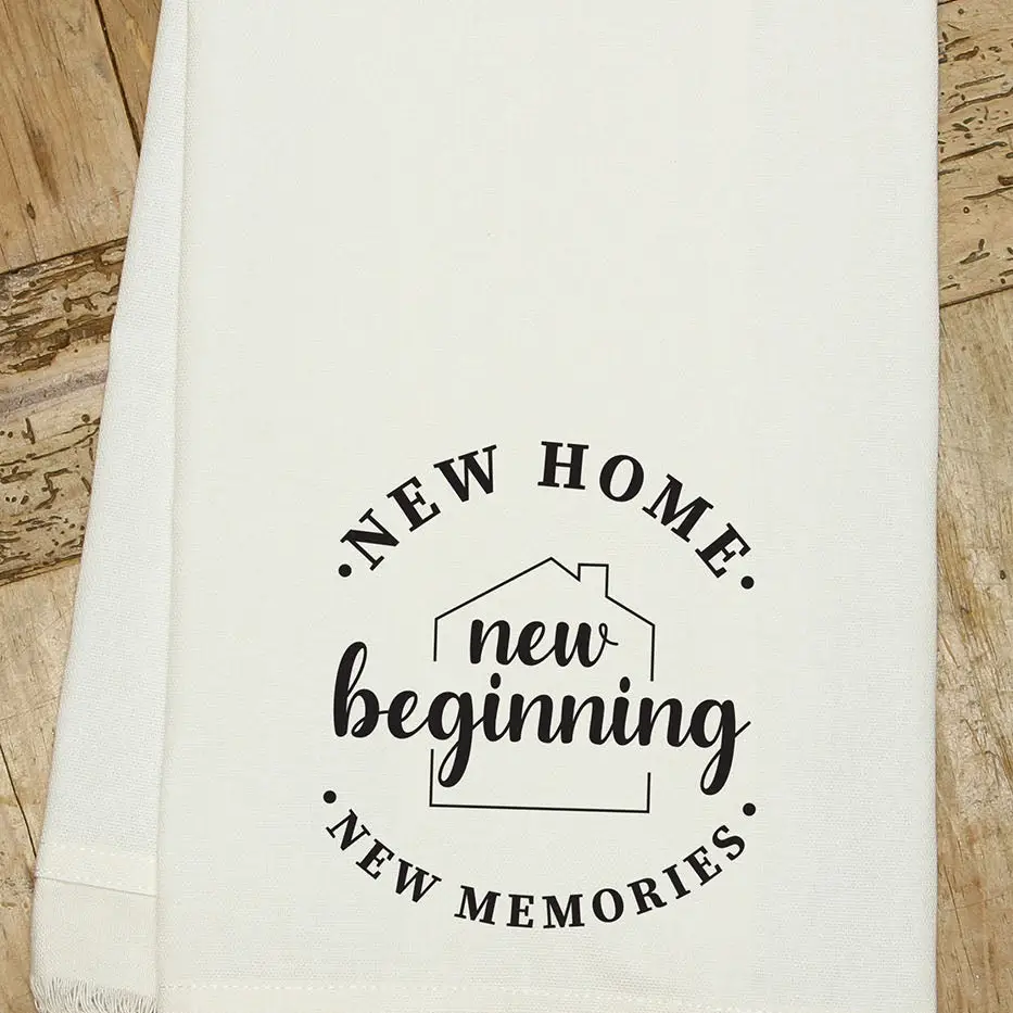 Featuring a white cloth with “NEW HOME, new beginning, NEW MEMORIES” and a house outline, Sonia's Vokalized Kreations’ Taco ‘Bout a New Beginning Housewarming Box is perfect for gifting to celebrate any new home.