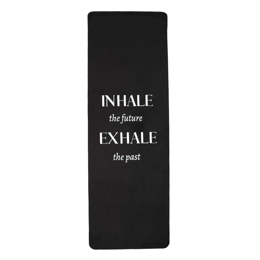 The eco-friendly yoga mat from Sonia's Vokalized Kreations, named "Inhale the Future Exhale the Past," features an inspiring message in white and is ideal for deep meditation sessions.