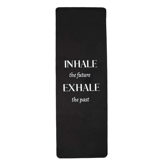 The eco-friendly yoga mat from Sonia's Vokalized Kreations, named "Inhale the Future Exhale the Past," features an inspiring message in white and is ideal for deep meditation sessions.