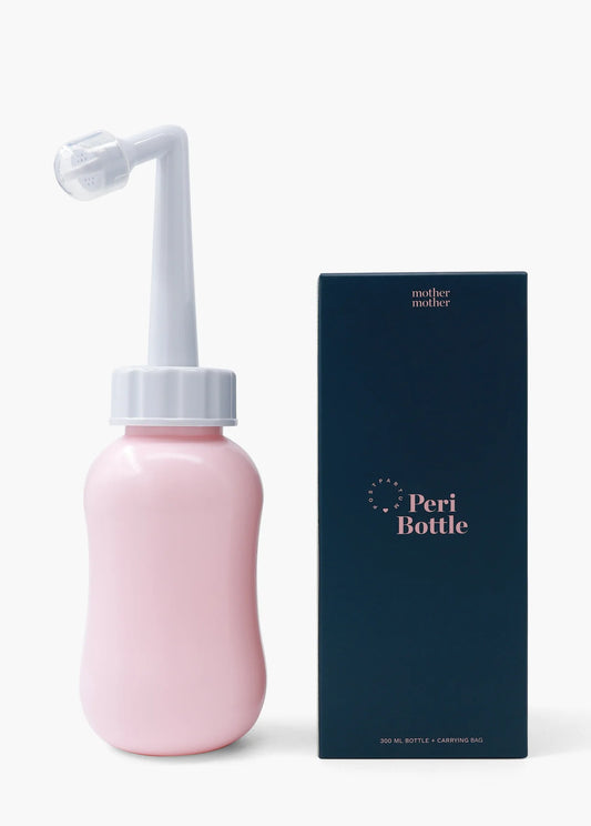 A pink peri wash bottle with a white angled spout sits next to a dark blue box labeled "Peri Bottle" by sonia's-vokalized-kreations, making it essential for postpartum perineum care.