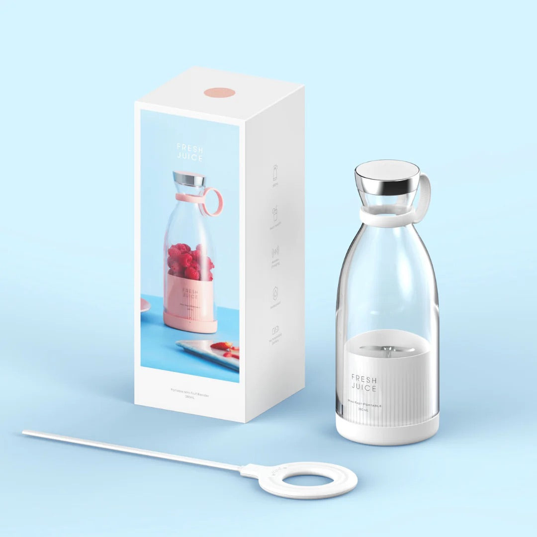 The boxed white "Portable Blender Bottle" from sonia's-vokalized-kreations with a detachable blade is placed next to its BPA-free version on a light blue background.