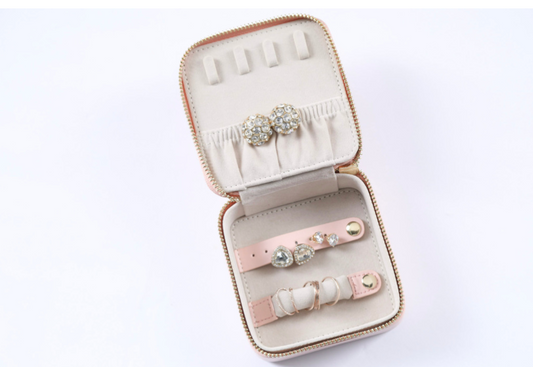 The "A Gift from the Bride" by sonia's-vokalized-kreations is an ideal bridesmaids gift, with a small jewelry box containing earrings and two pink leather bracelets embellished with shiny round gemstones.