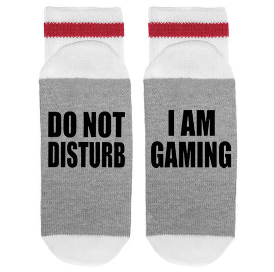 Sonia's Vokalized Kreations' Lumberjack Crew Socks in white and gray with red accents feature bold black "DO NOT DISTURB" and "I AM GAMING" text. Made from breathable fabric, they’re ideal for gaming marathons.