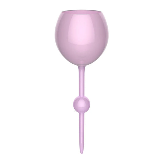 Sonia's Vokalized Kreations Floating Wine Glass for Beach, Pool & Outdoors is a pink, spherical, reusable acrylic glass with a pointed tip and round bulb on the stem, shown isolated on a white background.