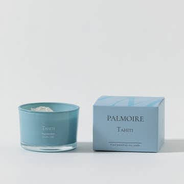 A blue glass soy wax candle and matching box, labeled "Boho Self-Care Home Gift Box" by Sonia's Vokalized Kreations, are displayed on a white background—an ideal boho-inspired gift for relaxation and self-care.