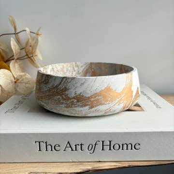 The Boho Self-Care Home Gift Box by Sonia's Vokalized Kreations features a marbled ceramic bowl, soy wax candle, and more—beautifully arranged for self-care lovers and boho decor fans.